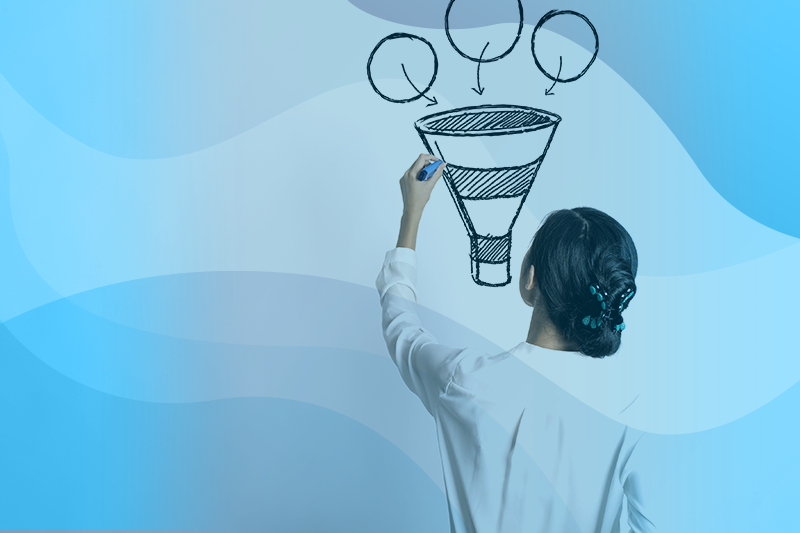 Woman Drawing A Funnel On A Whiteboard